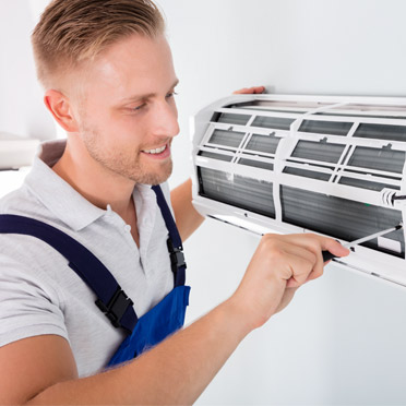 Technician providing HVAC services in Los Angeles.