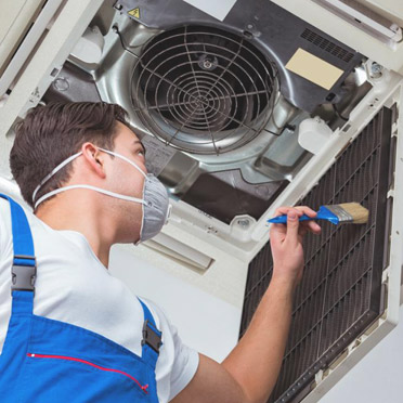 "Indoor Air Quality Specialists in Los Angeles performing an HVAC inspection.